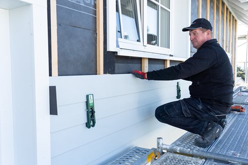 Hoe te beginnen met het beplanken van een gevel?